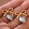23905080_f534a862-6b15-4d36-a0cb-524d2b076cca.jpg Piper 18K Heart Drop Earrings
