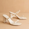 675e9cc4a7a60a194c0d1d00f99c3c2d903b3d9614ea673b6db3fccf4d29ed18.jpg Wendy Cream Double Strap Bow Heels